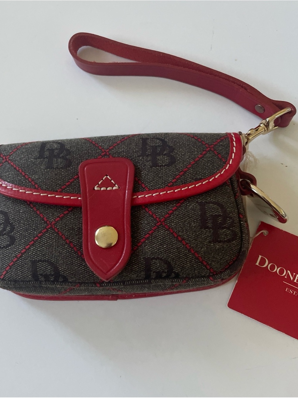 Dooney & Bourke Brown Signature Wristlet with Red Trim